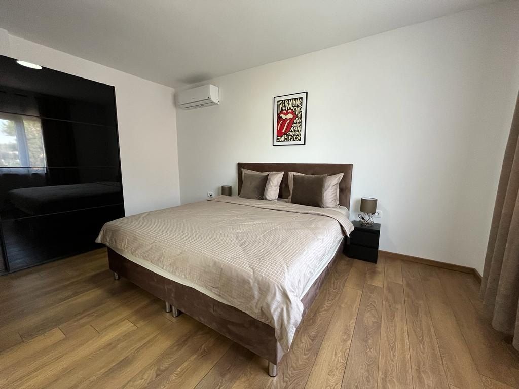 First bedroom with a queen-size bed
